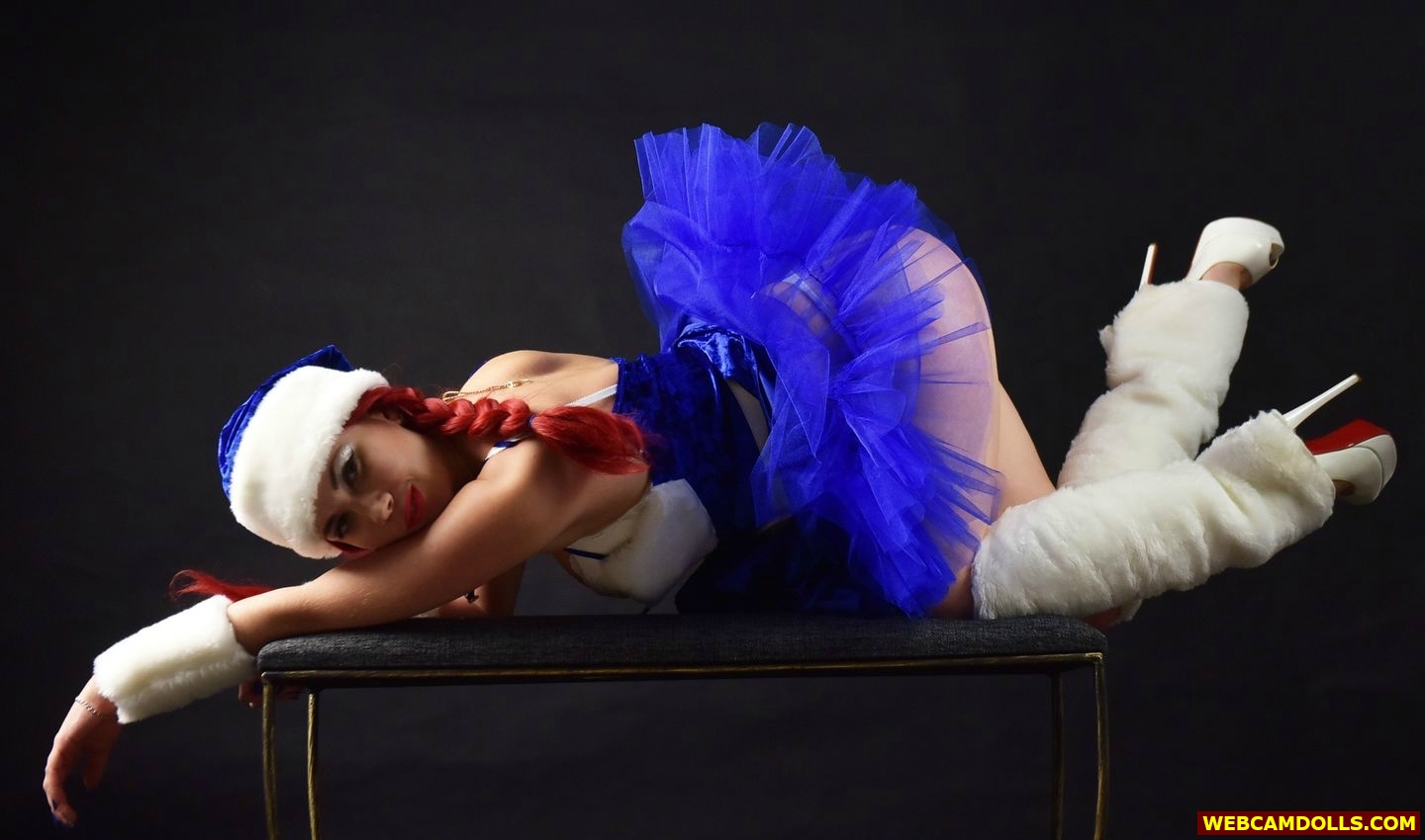 Redhead Girl in Santa Claus Costume and White Legwarmers on Webcamdolls